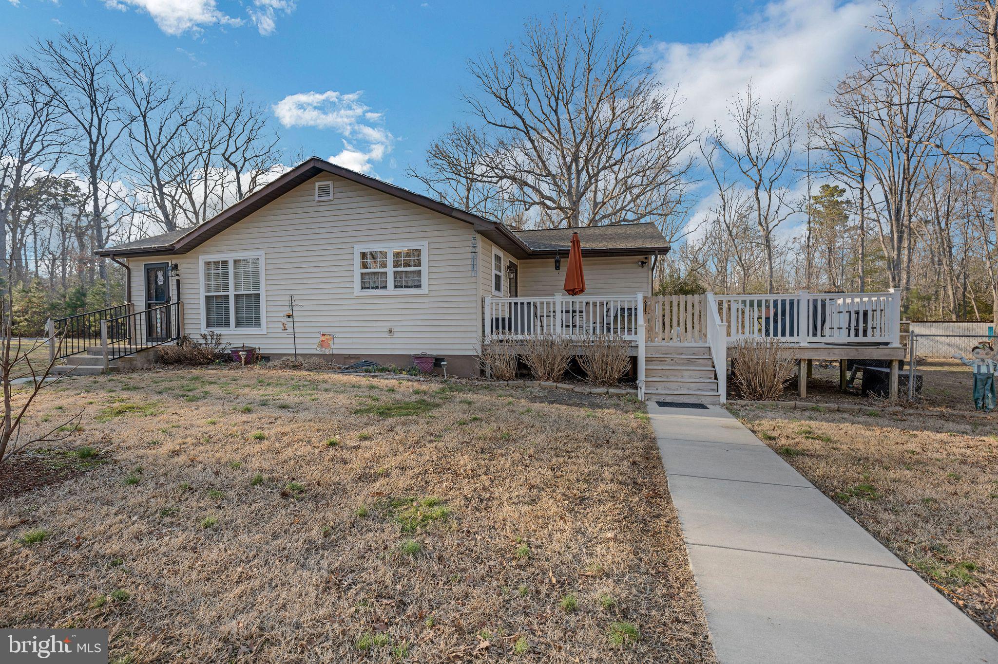 48550 Havirland Road Lexington Park, MD 20653 - Photo 6 of 36 a house with trees in the background