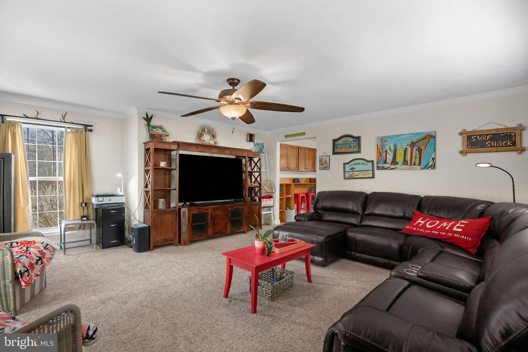 48550 Havirland Road Lexington Park, MD 20653 - Photo 9 of 36 a living room with furniture and a flat screen tv