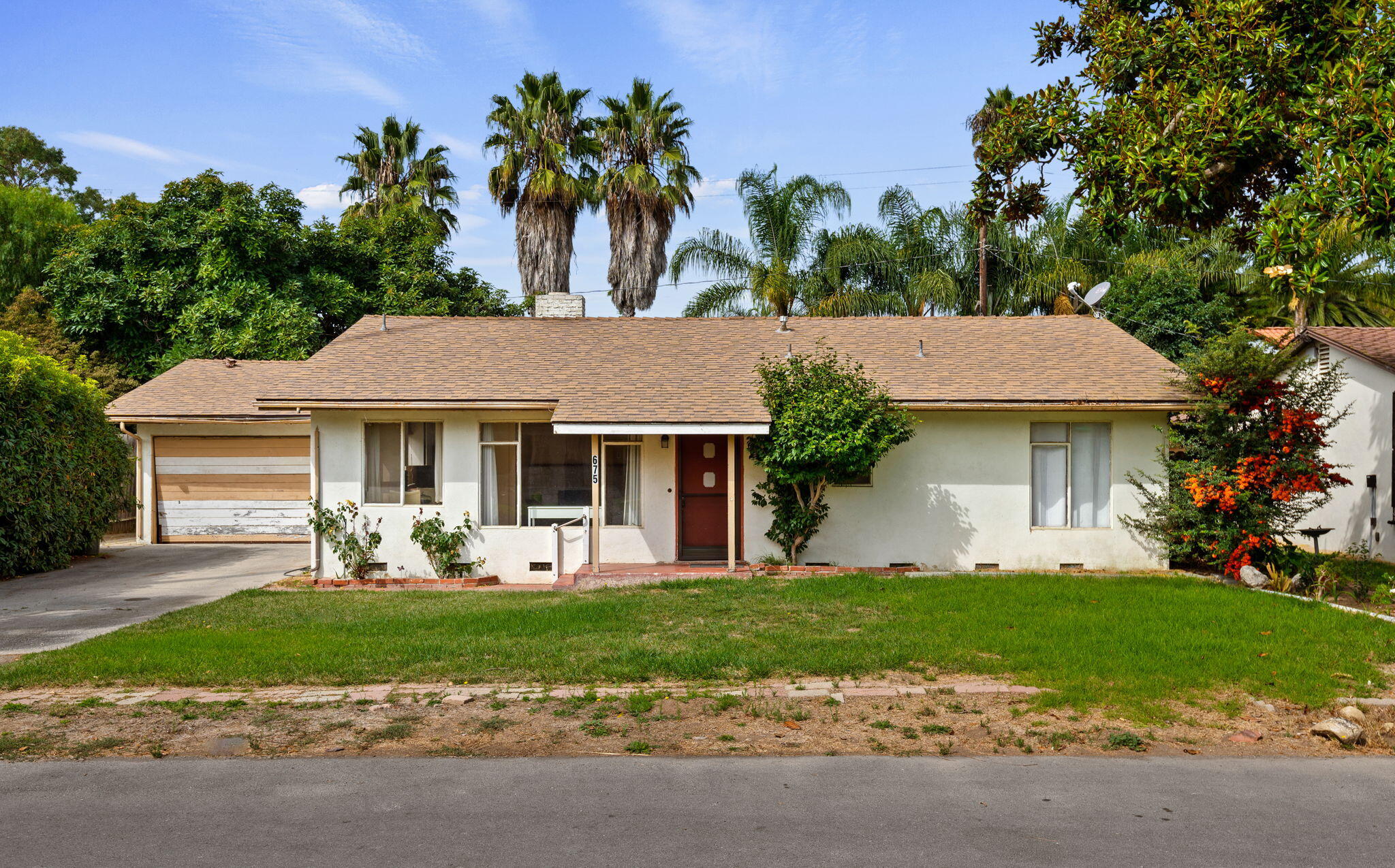 675 Northview Road Santa Barbara, CA 93105 - Photo 1 of 12 a front view of a house with garden and porch