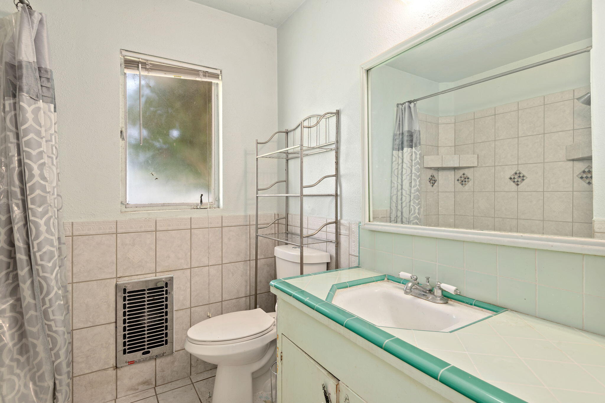 675 Northview Road Santa Barbara, CA 93105 - Photo 9 of 12 a bathroom with a sink toilet and shower