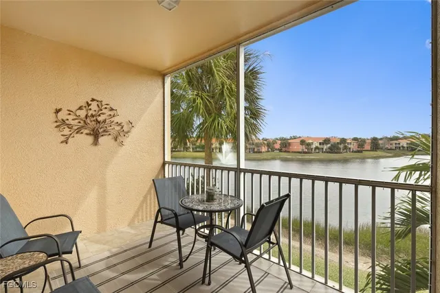 a view of a chairs and table in patio