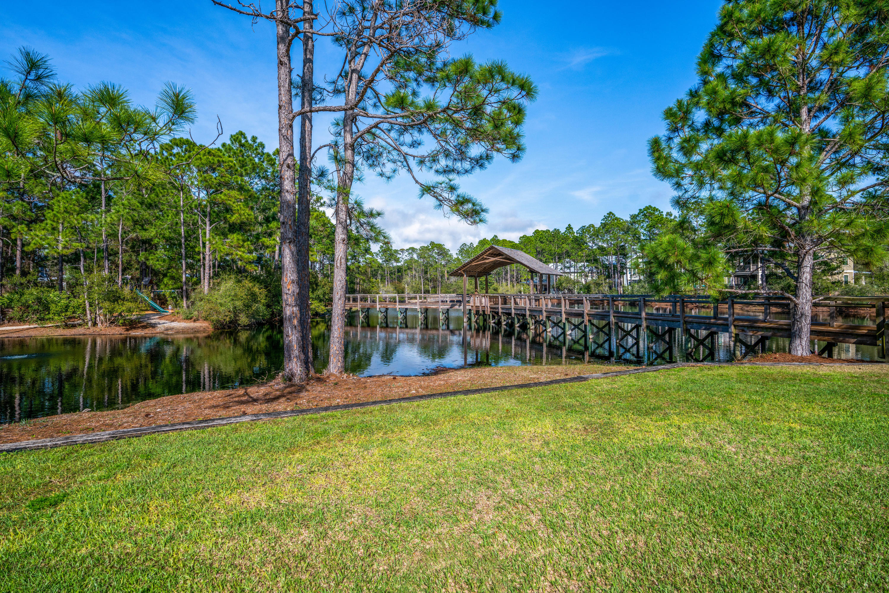 Lot 21 West Okeechobee Santa Rosa Beach Santa Rosa Beach, FL 32459 - Photo 16 of 37 a view of a garden with a slide