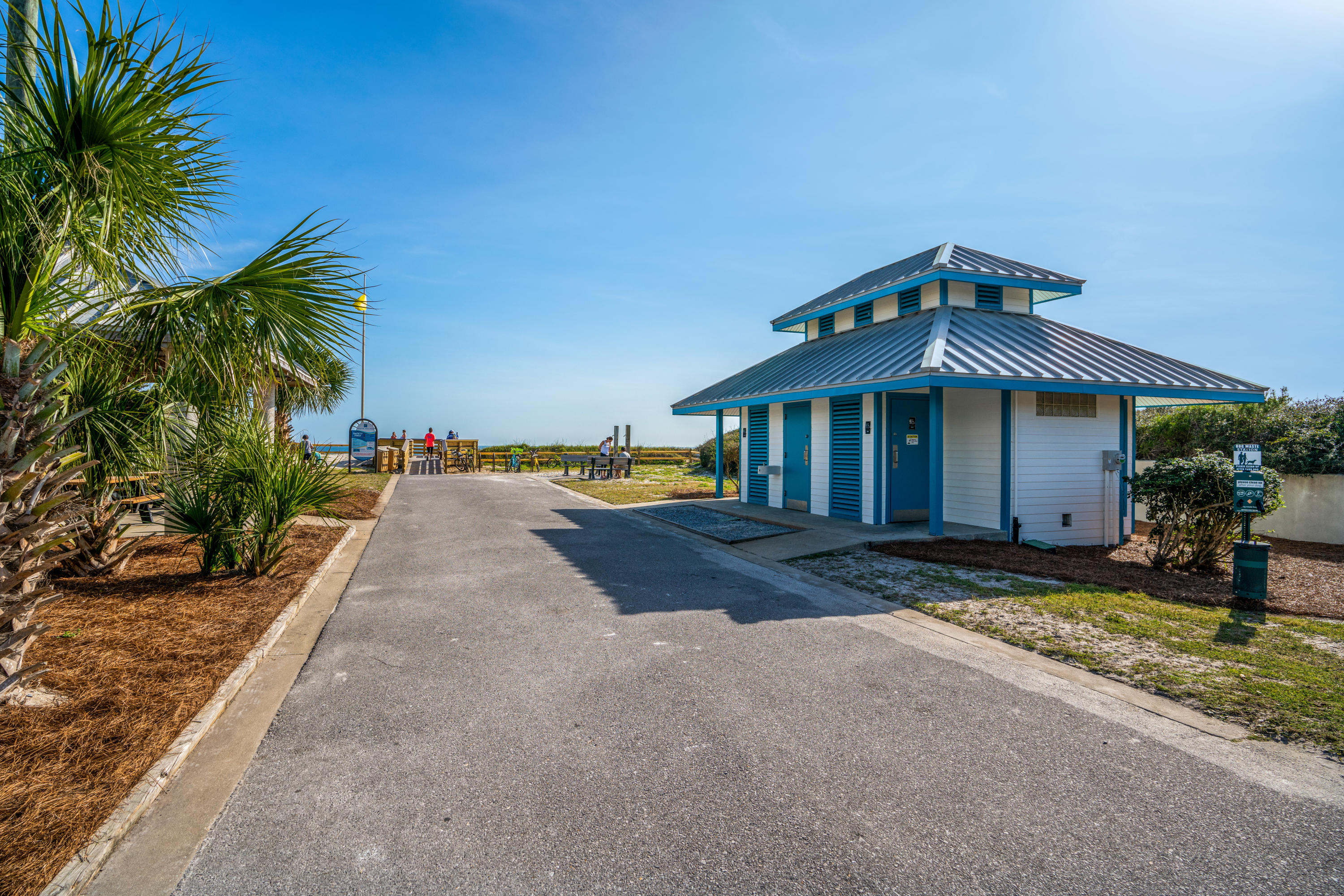 Lot 21 West Okeechobee Santa Rosa Beach Santa Rosa Beach, FL 32459 - Photo 23 of 37 a front view of a house with a yard and garage