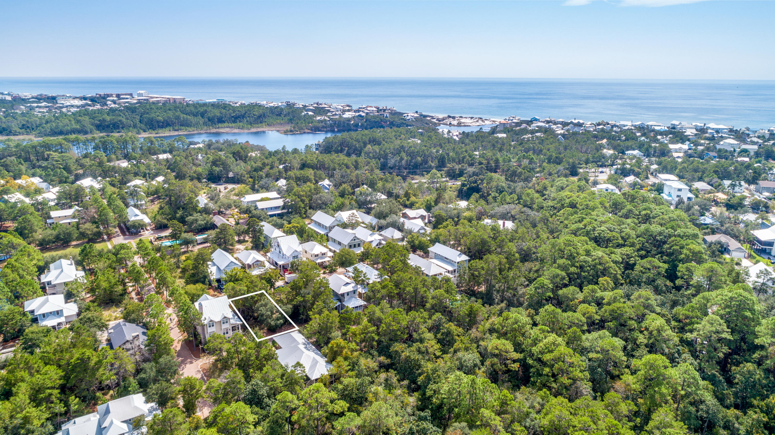 Lot 21 West Okeechobee Santa Rosa Beach Santa Rosa Beach, FL 32459 - Photo 33 of 37 an aerial view of a residential houses covered in trees