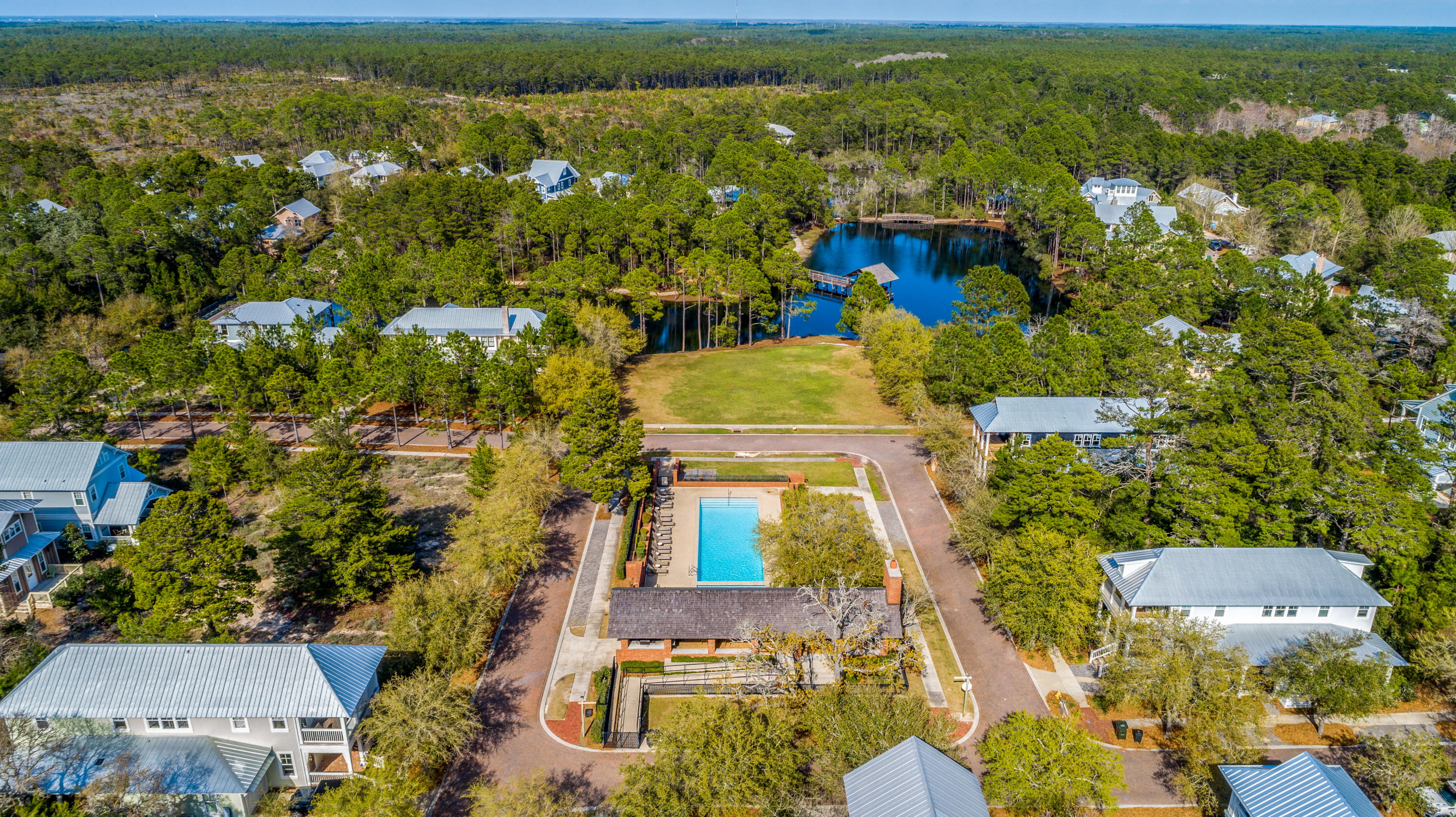 Lot 21 West Okeechobee Santa Rosa Beach Santa Rosa Beach, FL 32459 - Photo 7 of 37 an aerial view of residential houses with outdoor space and trees