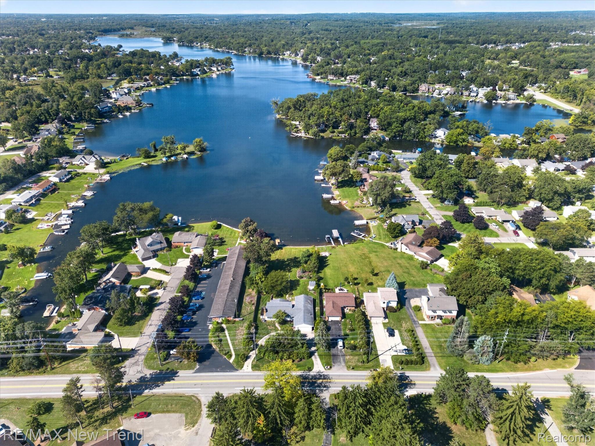 2529 South Commerce Road Walled Lake, MI 48390 - Photo 62 of 66 Expansive lakefront community with mature tree-lined streets, multiple private docks, and waterfront properties