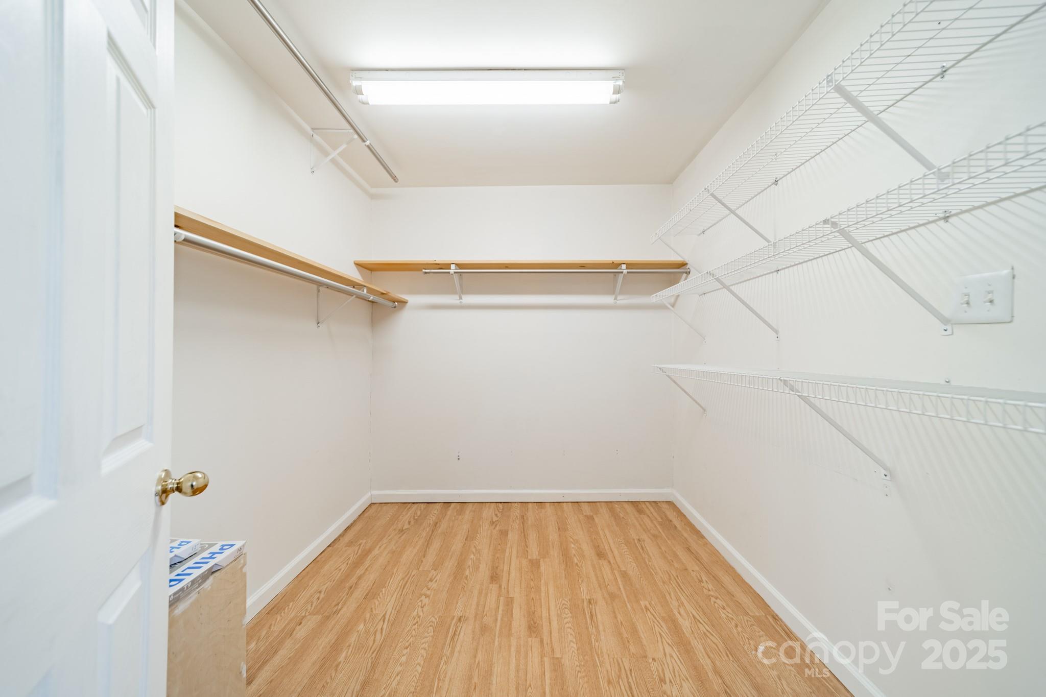 1300 Rama Road Charlotte, NC 28211 - Photo 15 of 30 a view of small space with racks on the wall