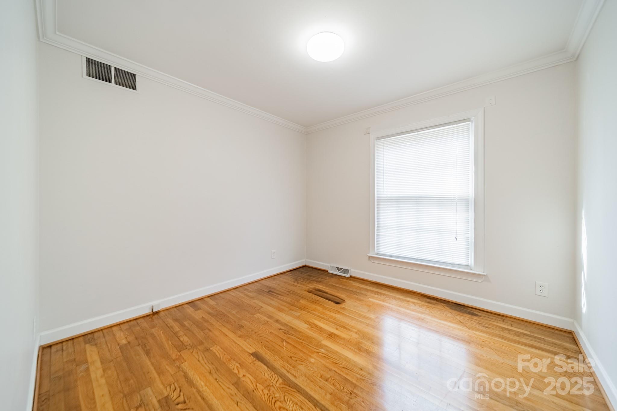 1300 Rama Road Charlotte, NC 28211 - Photo 17 of 30 an empty room with a window
