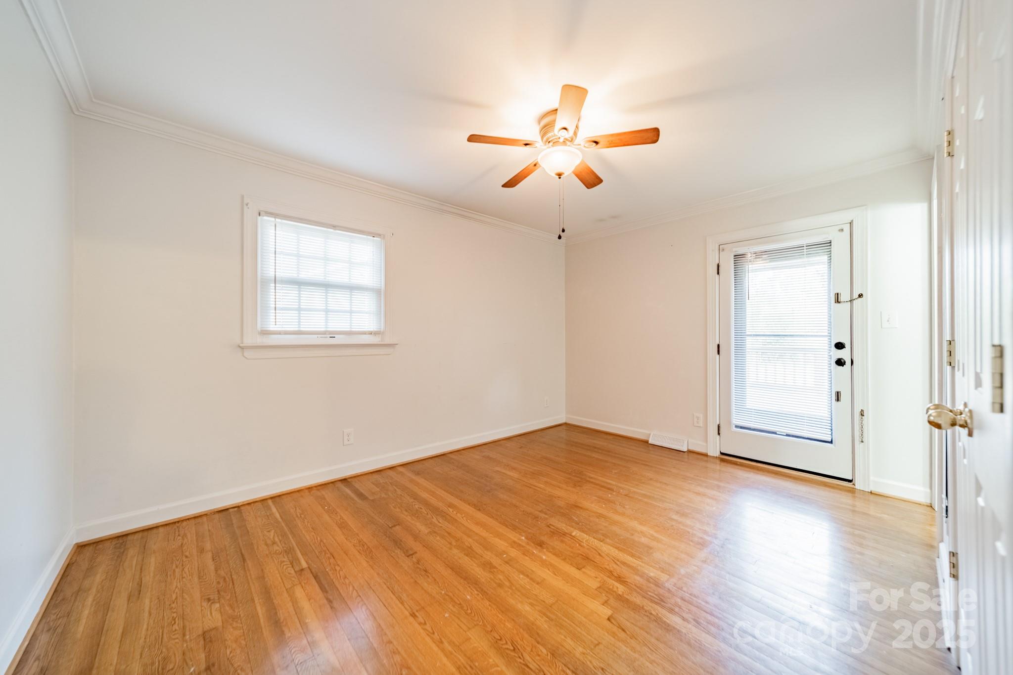 1300 Rama Road Charlotte, NC 28211 - Photo 21 of 30 a view of empty room with wooden floor and fan