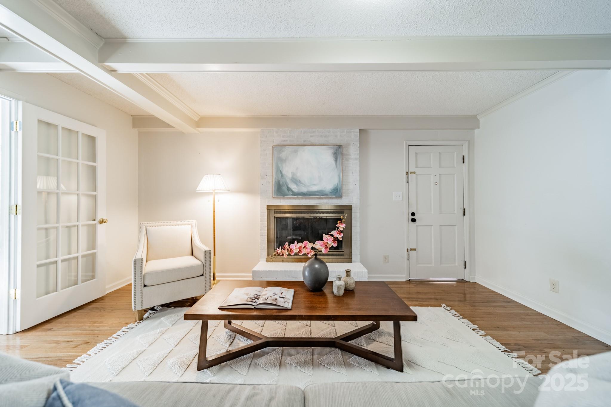 1300 Rama Road Charlotte, NC 28211 - Photo 5 of 30 a living room with furniture and a fireplace