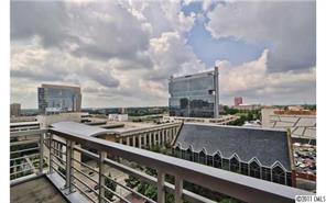 435 South Tryon Street, Unit 704 Charlotte, NC 28202 - Photo 7 of 13 a view of a buildings from a balcony