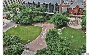 435 South Tryon Street, Unit 704 Charlotte, NC 28202 - Photo 9 of 13 a view of a garden with a building