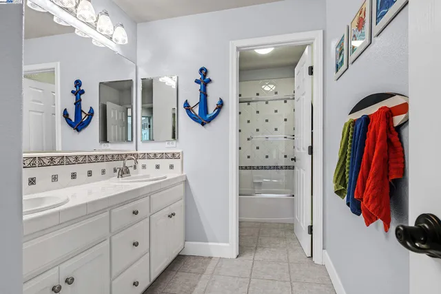 a bathroom with a bathtub and a toilet