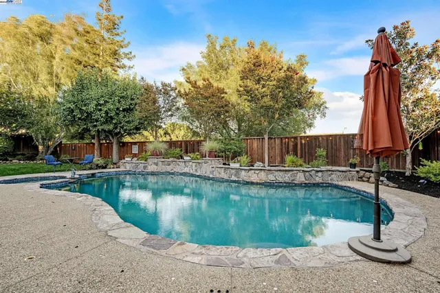 a view of backyard with green space