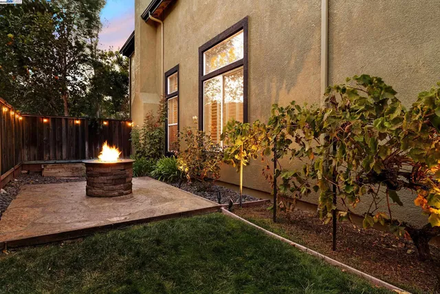 a view of a swimming pool with a yard