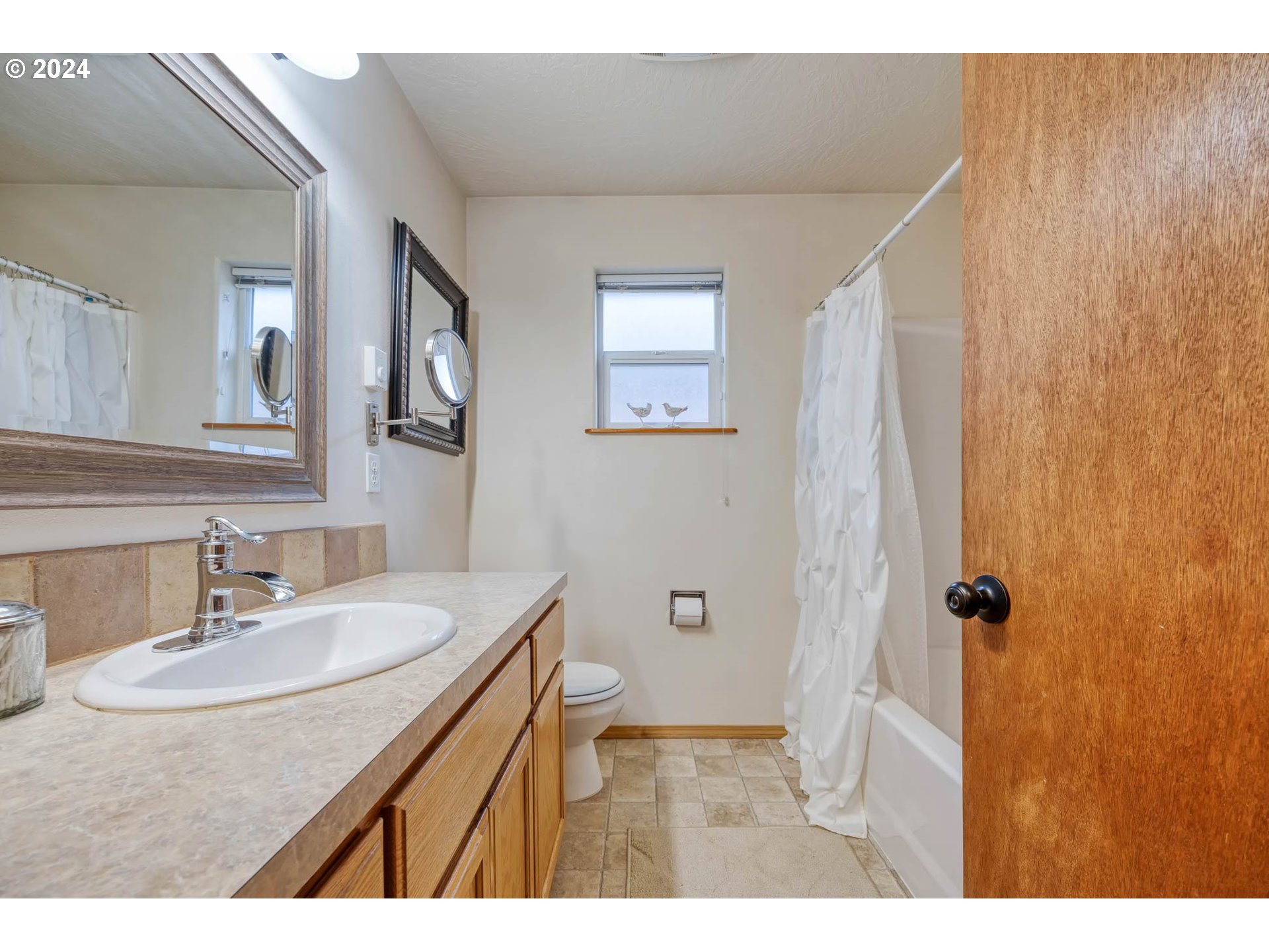 4850 A Street Springfield, OR 97478 - Photo 27 of 40 a bathroom with a sink and a mirror