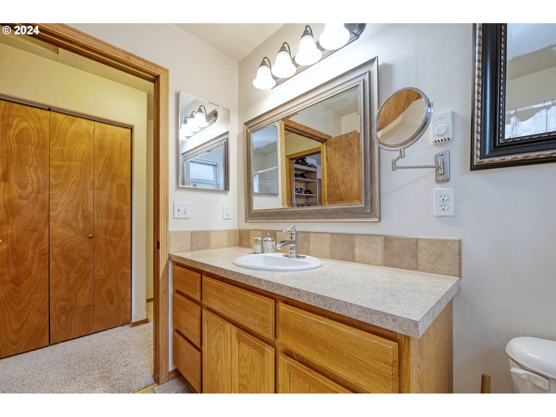 4850 A Street Springfield, OR 97478 - Photo 28 of 40 a bathroom with a sink and a mirror