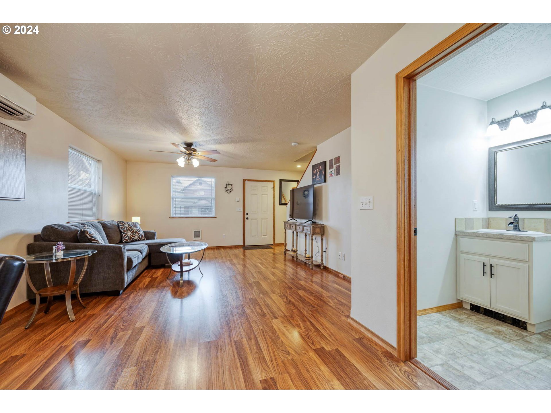 4850 A Street Springfield, OR 97478 - Photo 7 of 40 a living room with furniture and a wooden floor