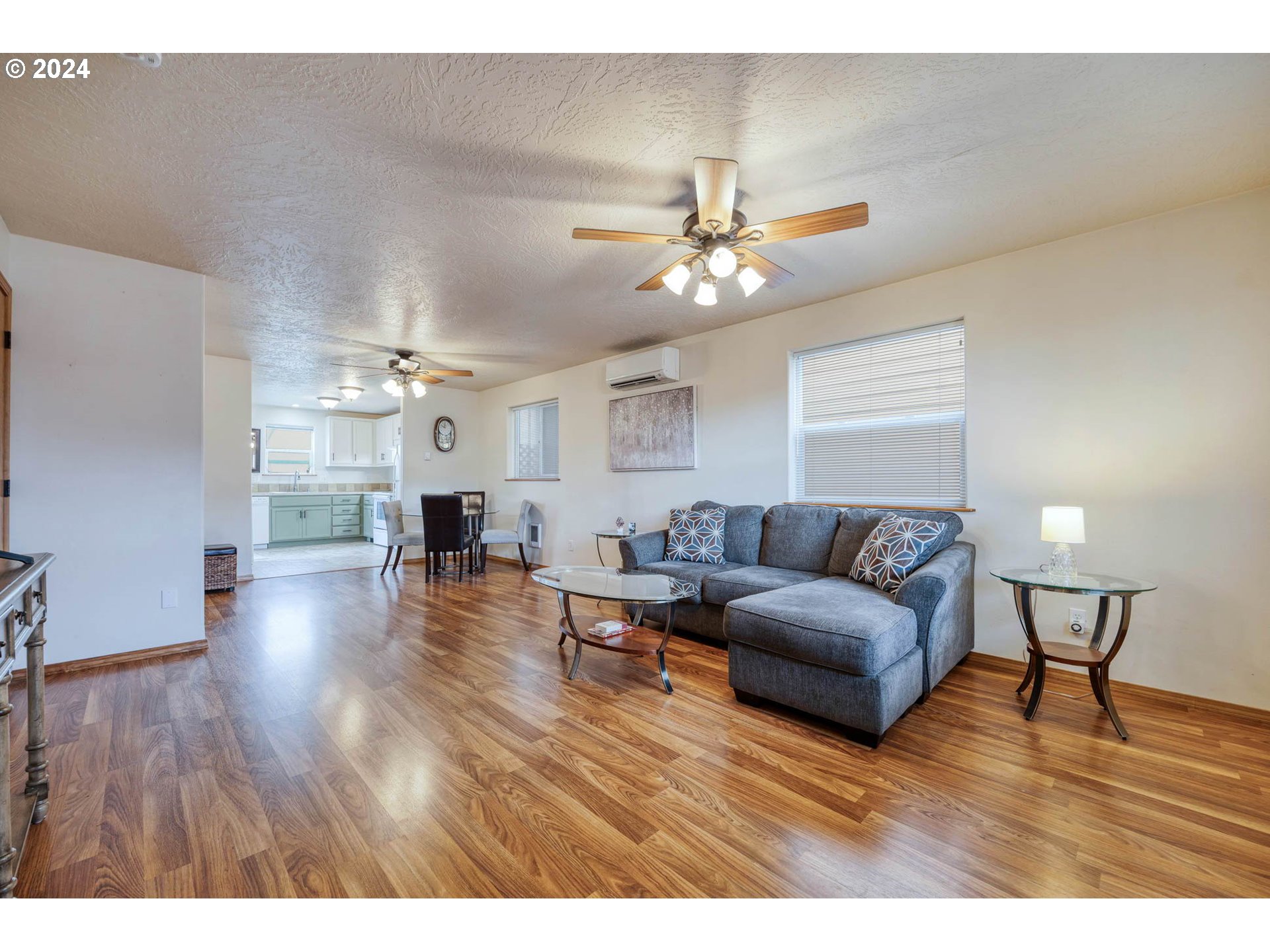 4850 A Street Springfield, OR 97478 - Photo 8 of 40 a living room with furniture and a wooden floor
