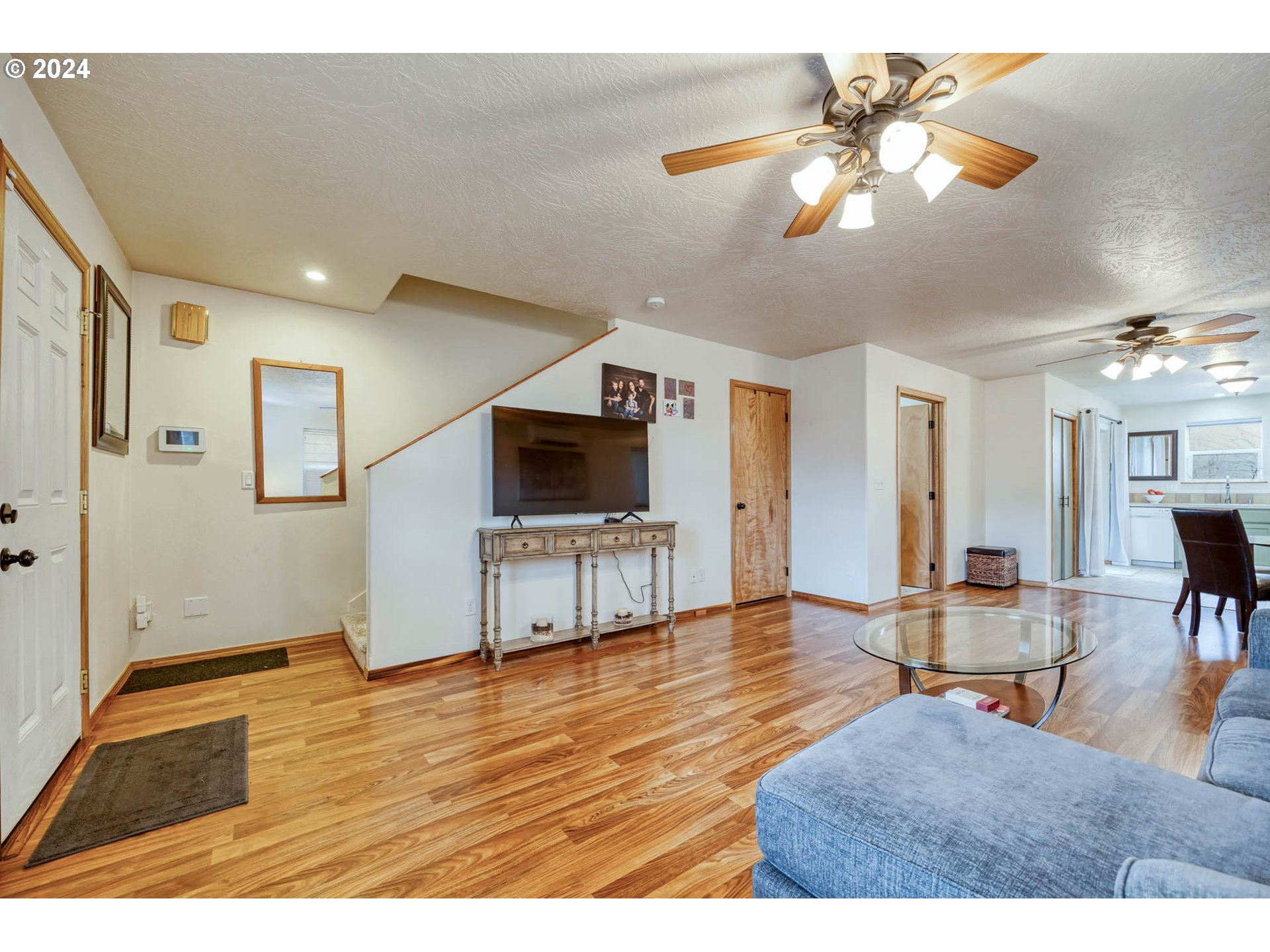 4850 A Street Springfield, OR 97478 - Photo 10 of 40 a living room with furniture and a flat screen tv