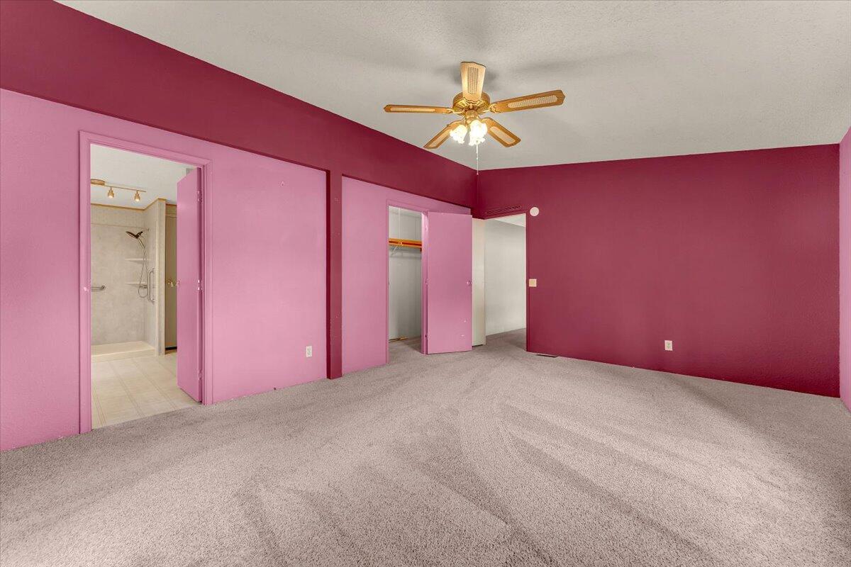 1237 Mountain Shadows Boulevard Redding, CA 96003 - Photo 18 of 34 a view of empty room with a fan