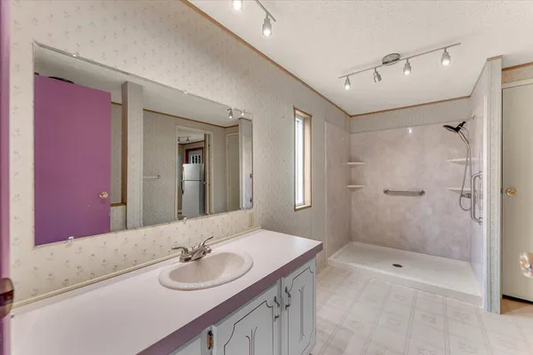 a bathroom with a bath tub
