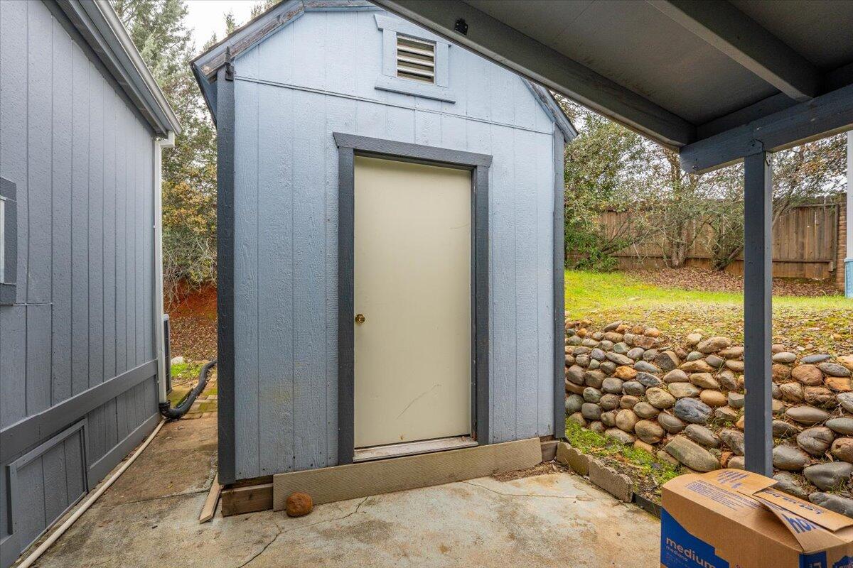1237 Mountain Shadows Boulevard Redding, CA 96003 - Photo 31 of 34 a view of a porch