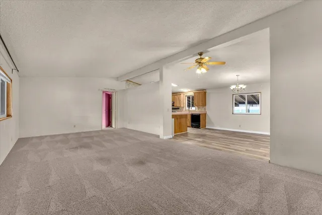 a view of empty room with windows