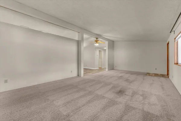 a view of empty room with windows