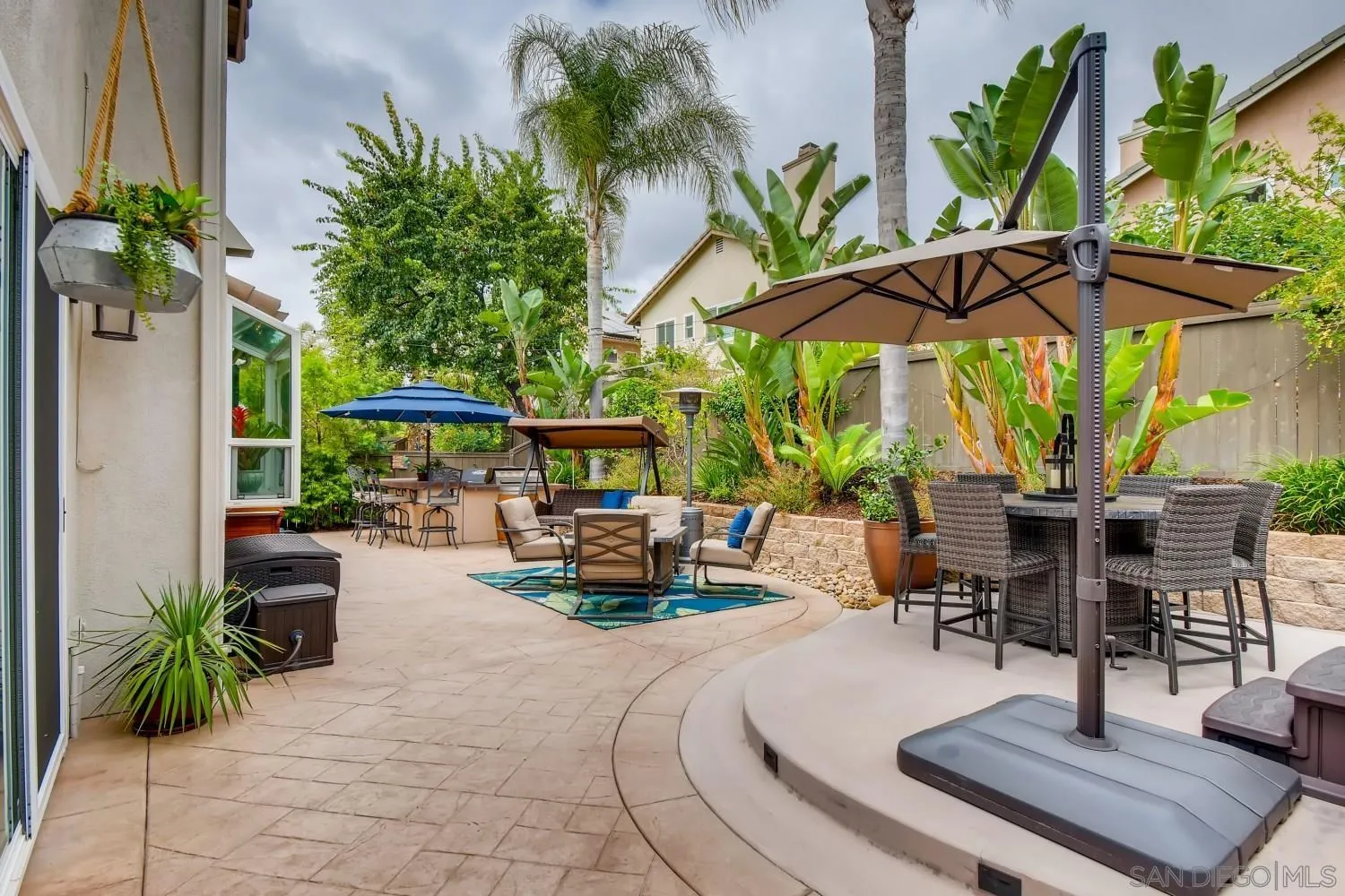 11468 Village Ridge Road San Diego, CA 92131 - Photo 26 of 28 a view of outdoor space yard deck patio and outdoor kitchen