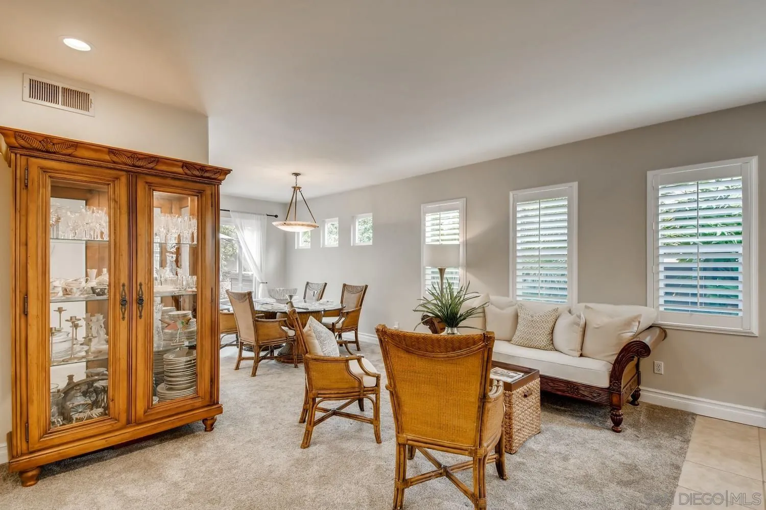 11468 Village Ridge Road San Diego, CA 92131 - Photo 5 of 28 a living room with furniture and a window
