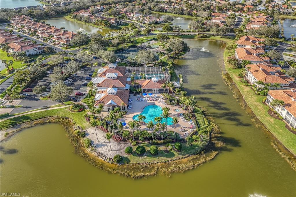 3055 Horizon Lane, Unit 1706 Naples, FL 34109 - Photo 38 of 42 a aerial view of a house with a lake view