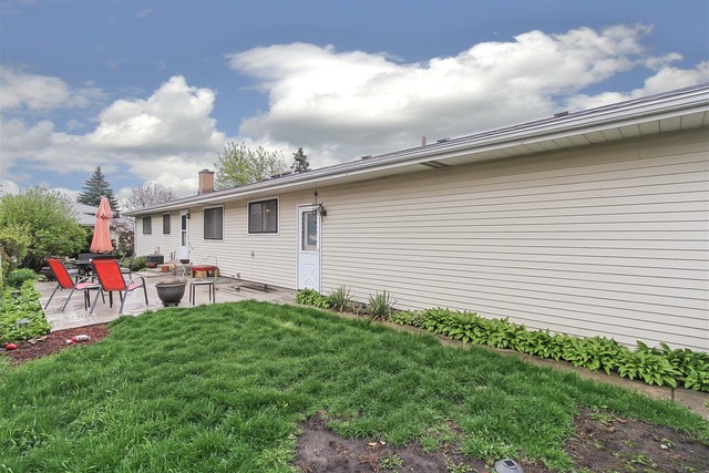 802 Sable Avenue Addison, IL 60101 - Photo 22 of 22 a view of a house with backyard and sitting area