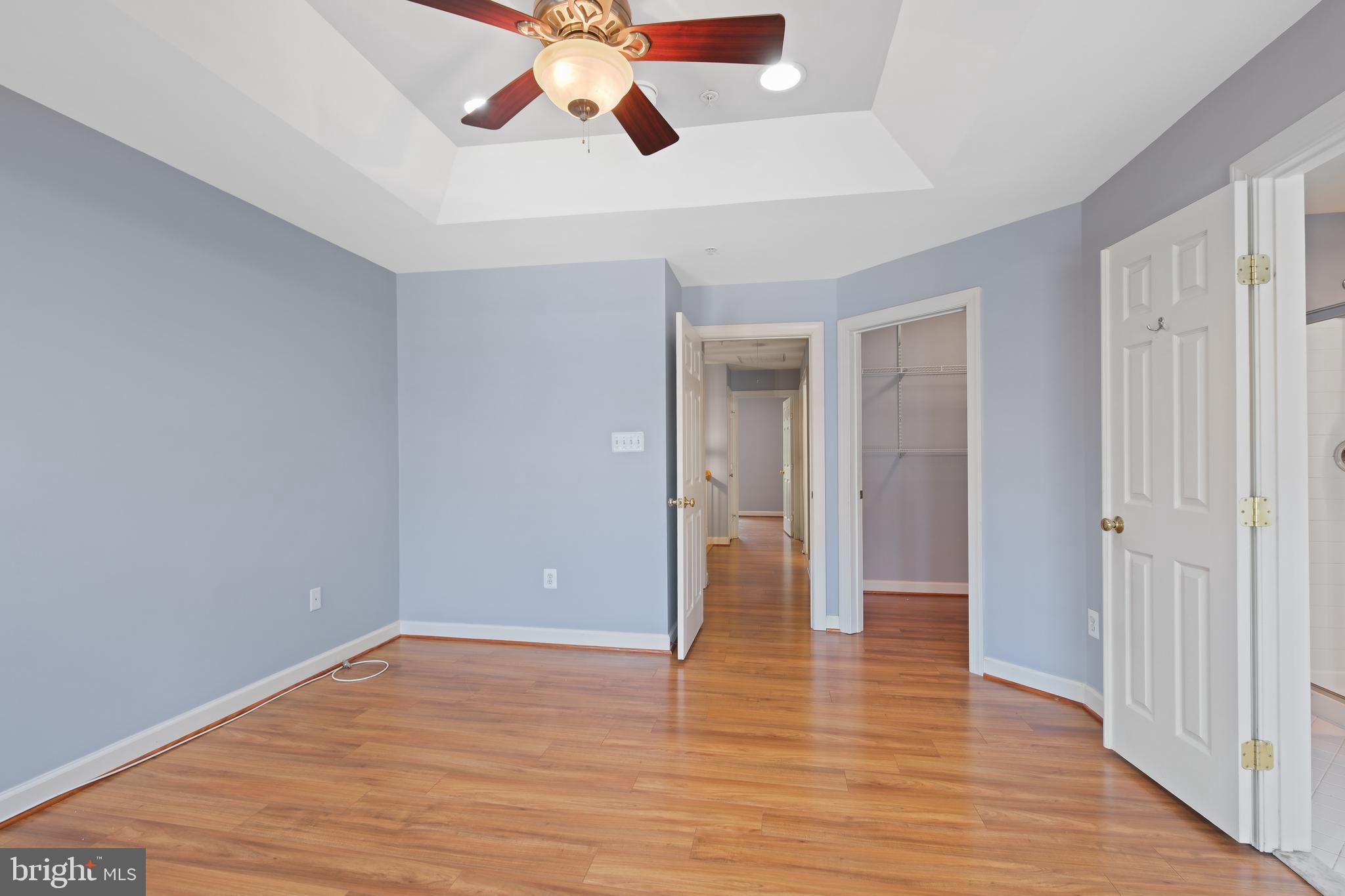 10728 Horde Street Silver Spring, MD 20902 - Photo 19 of 38 a view of an empty room and wooden floor