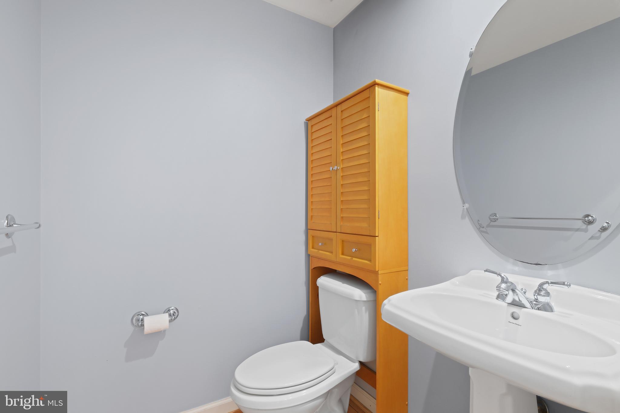10728 Horde Street Silver Spring, MD 20902 - Photo 24 of 38 a bathroom with a sink a toilet and shower