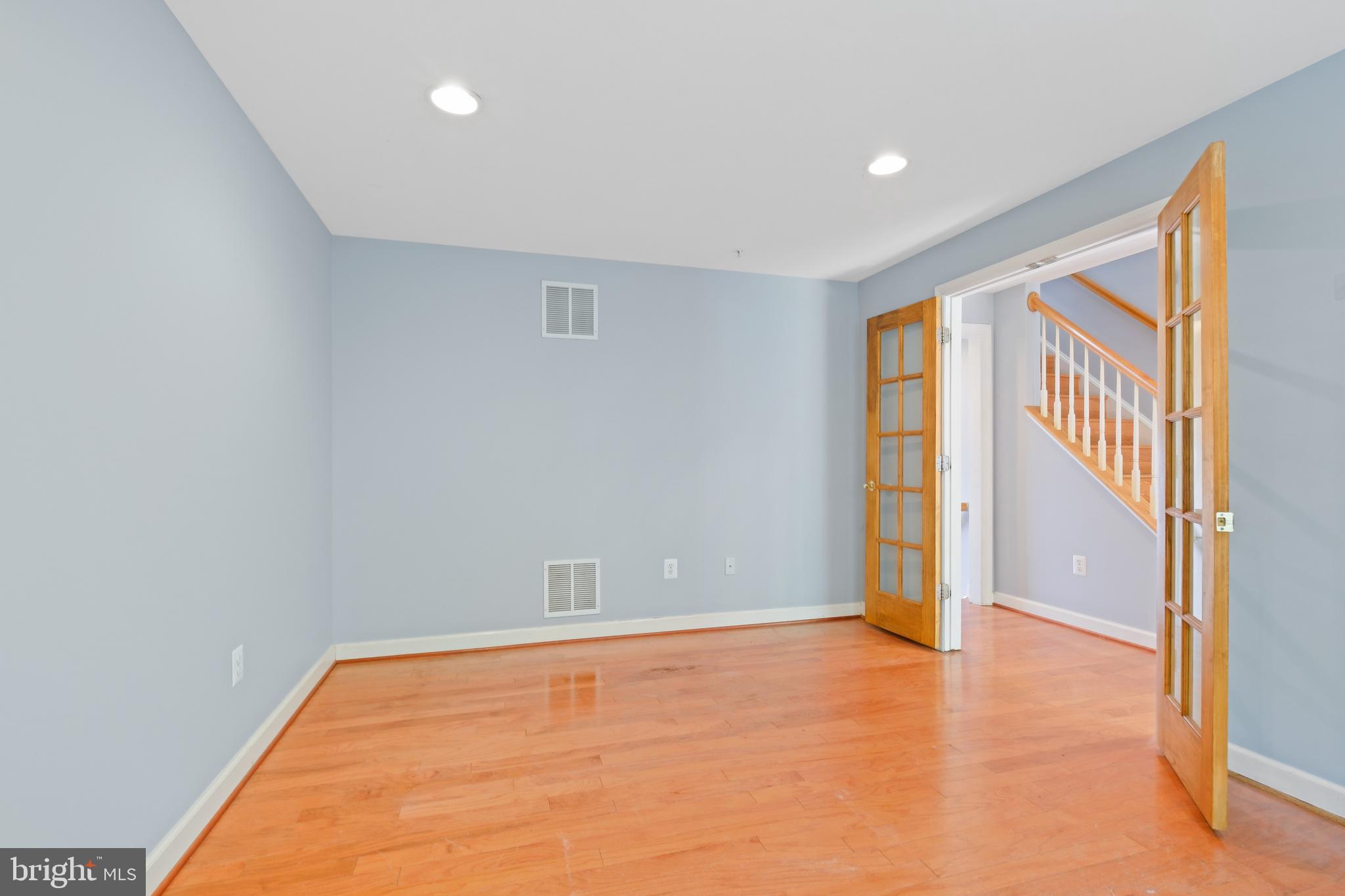 10728 Horde Street Silver Spring, MD 20902 - Photo 28 of 38 a view of an empty room with a window