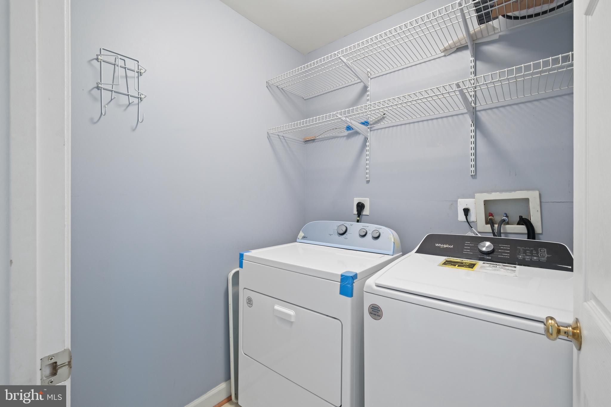 10728 Horde Street Silver Spring, MD 20902 - Photo 29 of 38 a utility room with dryer and washer