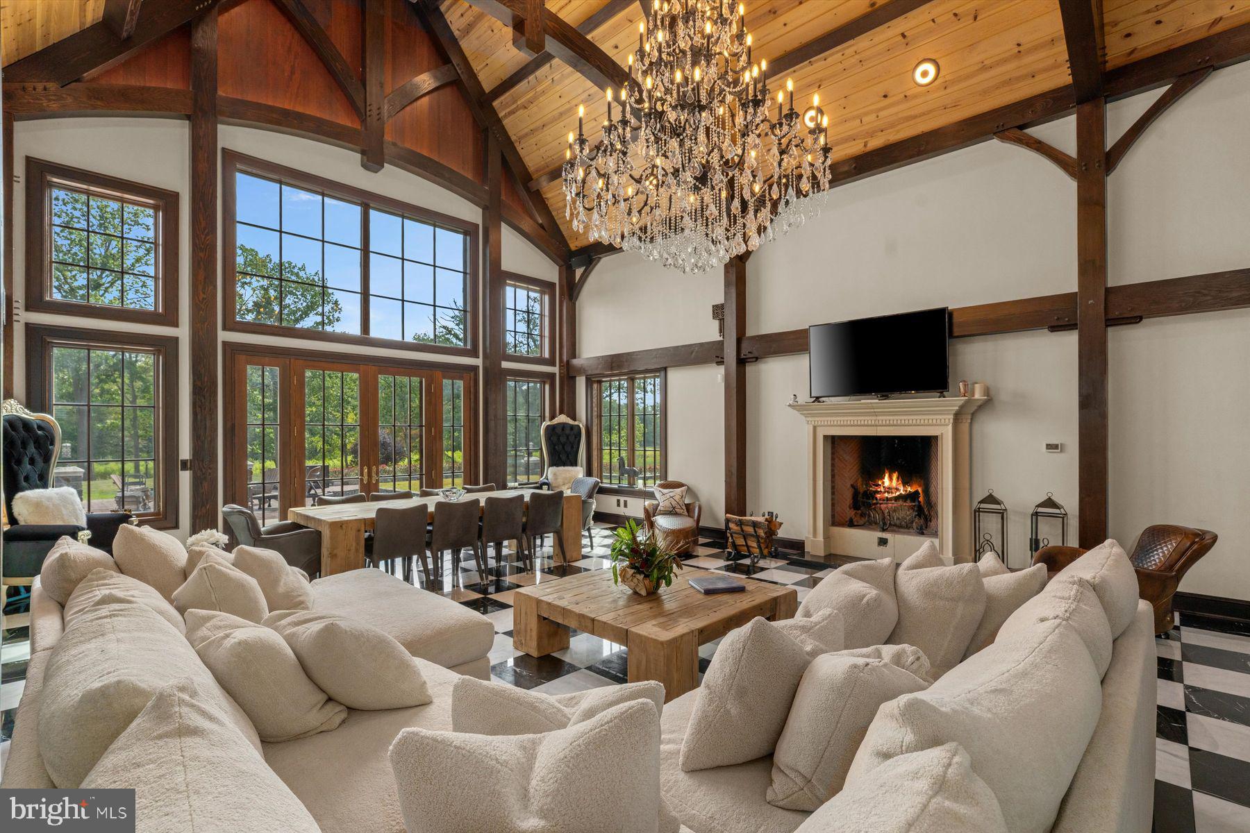 50 Mill Road Swedesboro, NJ 08085 - Photo 13 of 99 a living room with furniture large windows and a fireplace