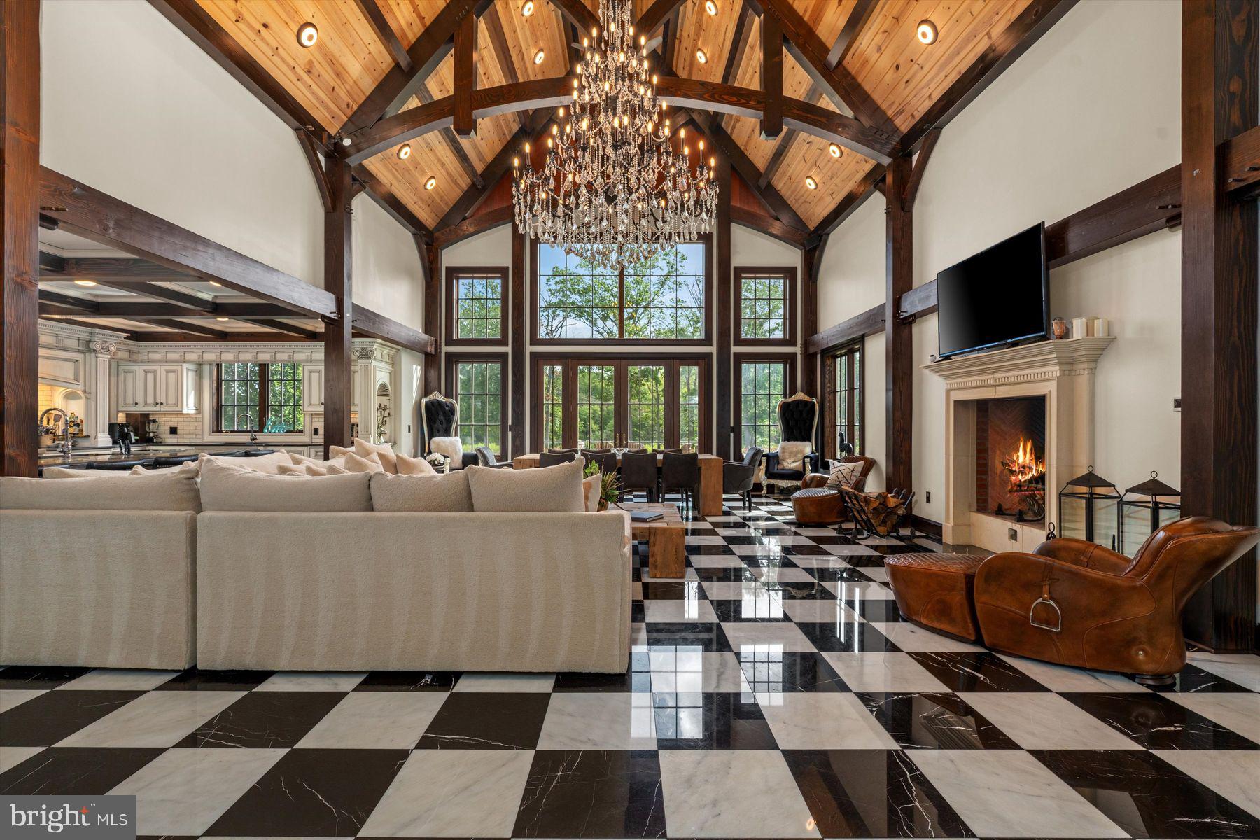 50 Mill Road Swedesboro, NJ 08085 - Photo 14 of 99 a living room with furniture a fireplace and a flat screen tv