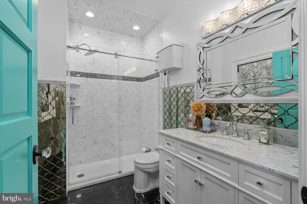 a bathroom with a sink and a shower