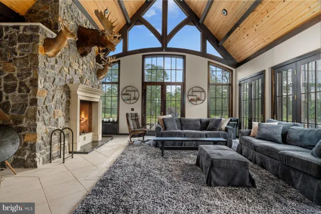 a house view with a sitting space and garden space