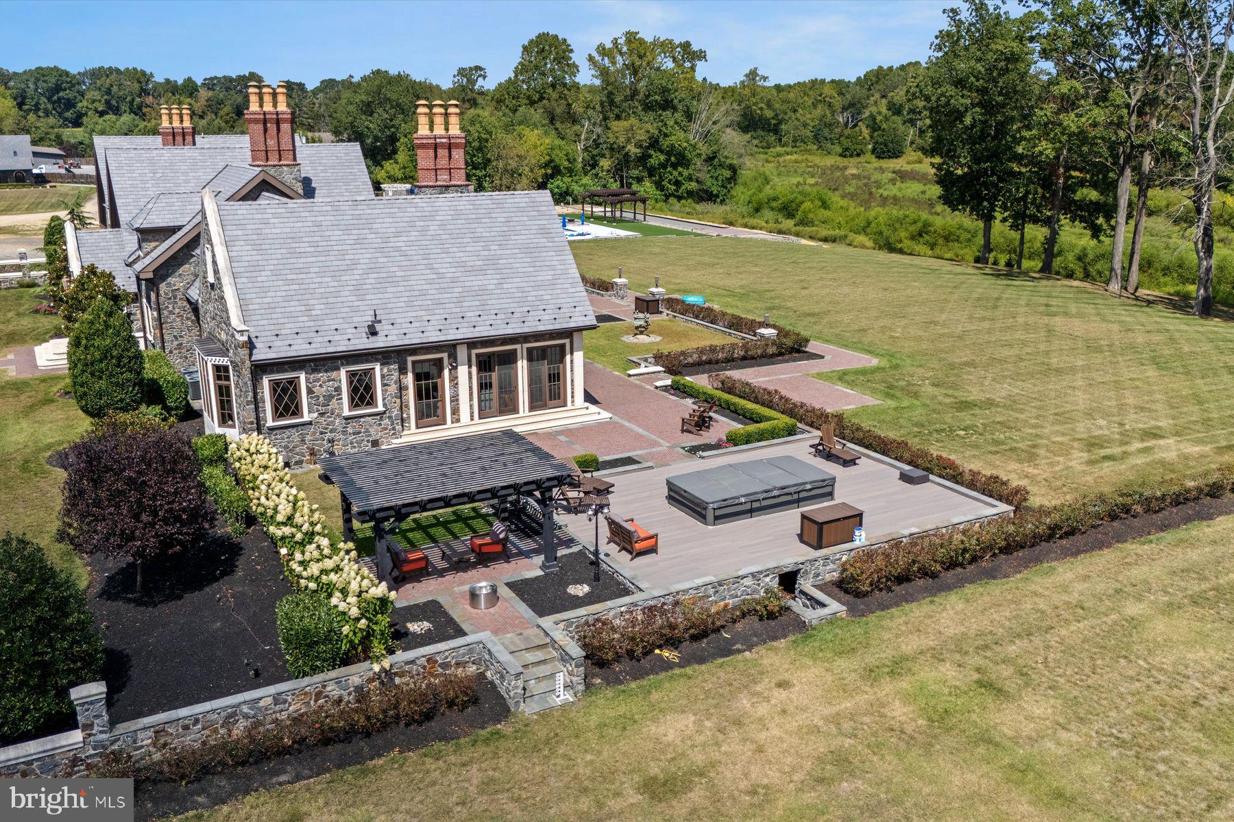 50 Mill Road Swedesboro, NJ 08085 - Photo 41 of 99 an aerial view of a house with a garden and lake view