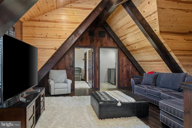 a kitchen with stainless steel appliances granite countertop a stove a sink dishwasher and a refrigerator