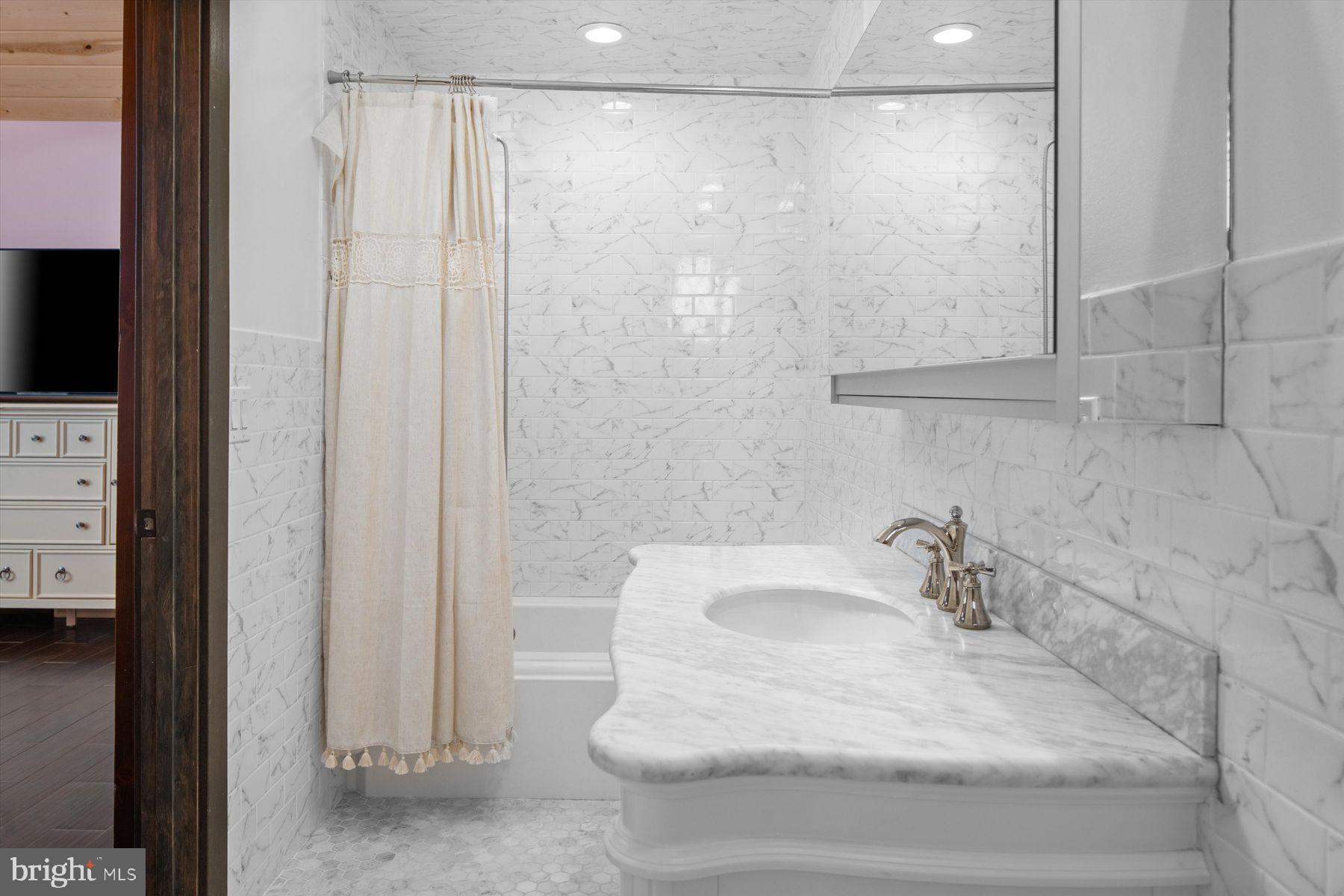 50 Mill Road Swedesboro, NJ 08085 - Photo 48 of 99 a bathroom with a sink and a shower