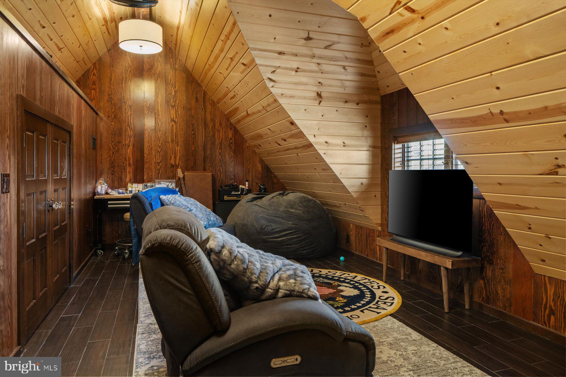 50 Mill Road Swedesboro, NJ 08085 - Photo 52 of 99 a living room with furniture and a flat screen tv
