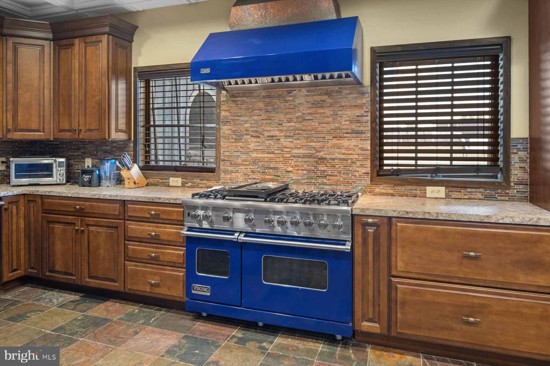 50 Mill Road Swedesboro, NJ 08085 - Photo 78 of 99 a kitchen with stainless steel appliances granite countertop a stove and a microwave