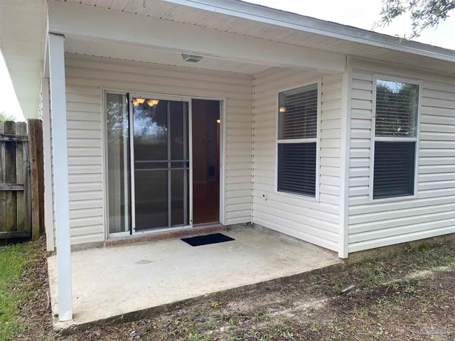 a view of backyard with tree