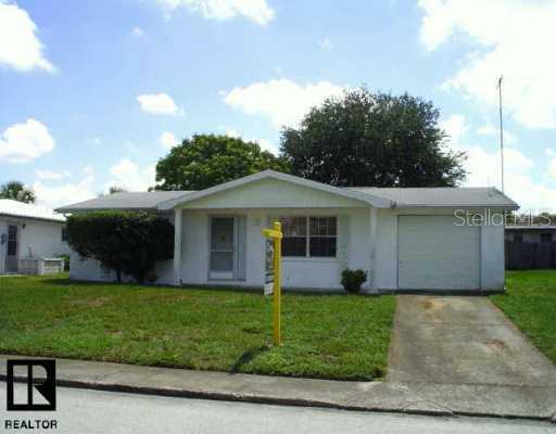 9026 Rainbow Lane Port Richey, FL 34668 - Photo 1 of 1 Exterior Front - Front