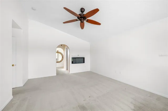 a view of a livingroom with a ceiling fan