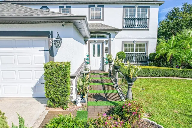 a view of front of house with a yard